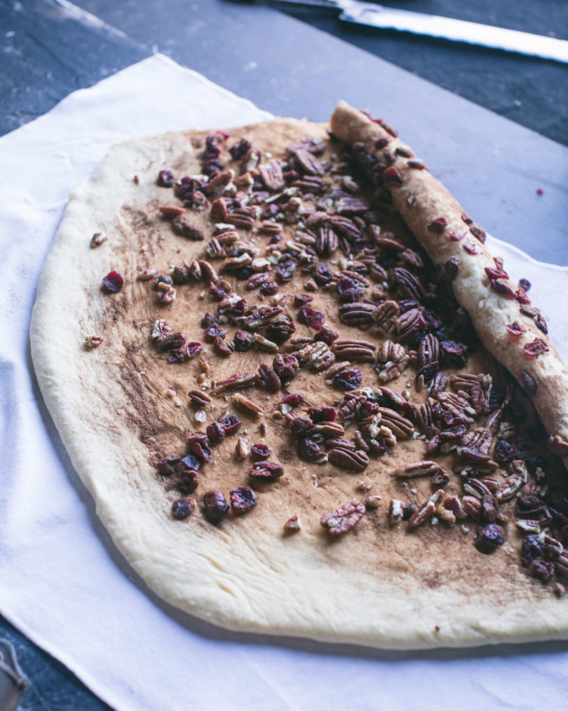 Add the pecans and roll up the dough