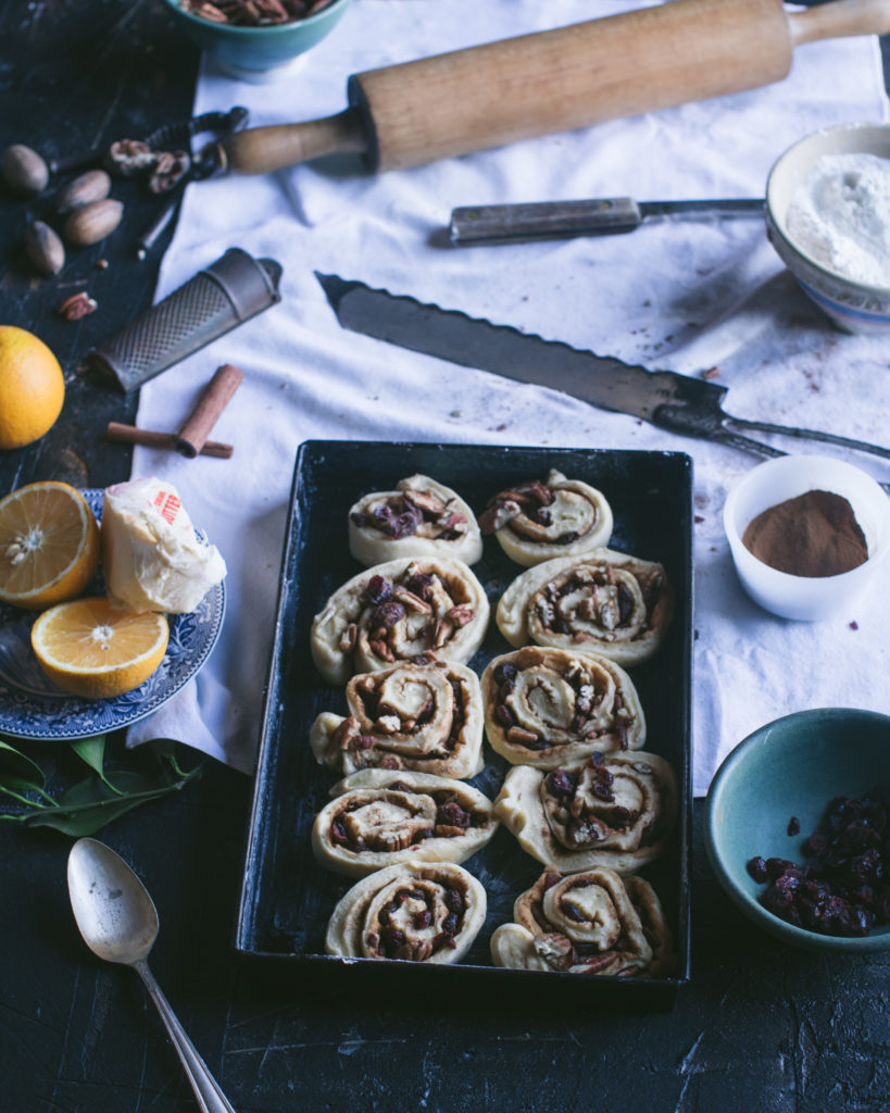 Uncooked cinnamon rolls in pan