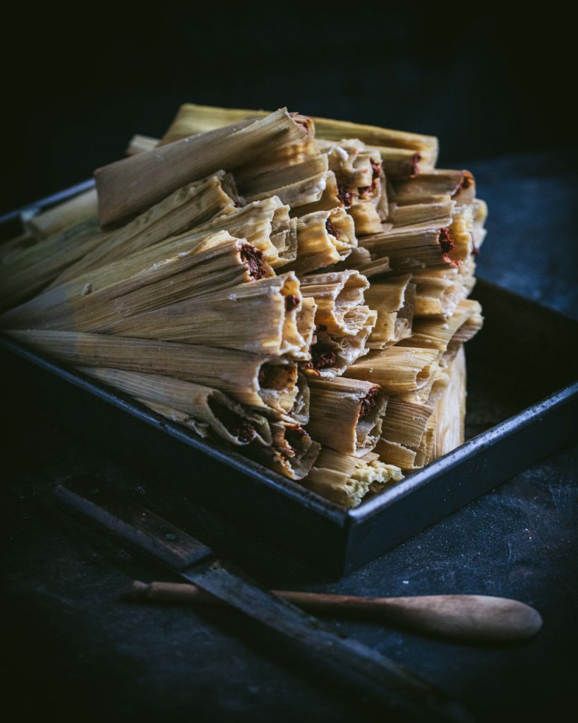 Stack of uncooked tamales