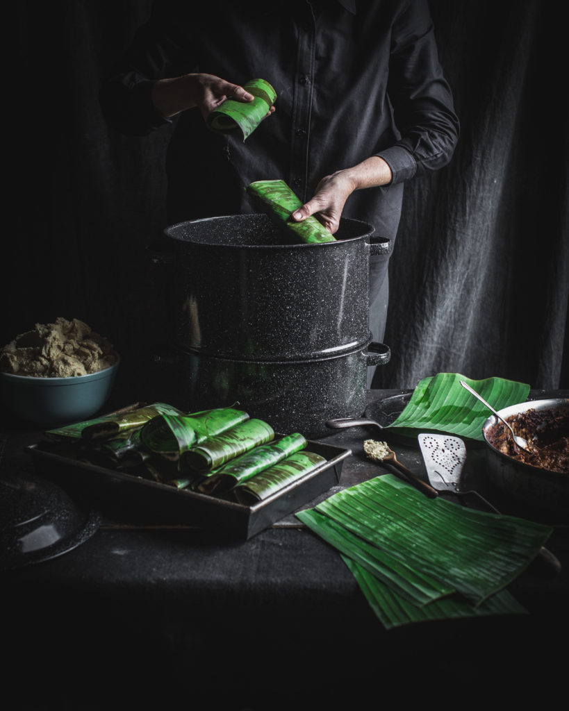 Loading tamales in steamer