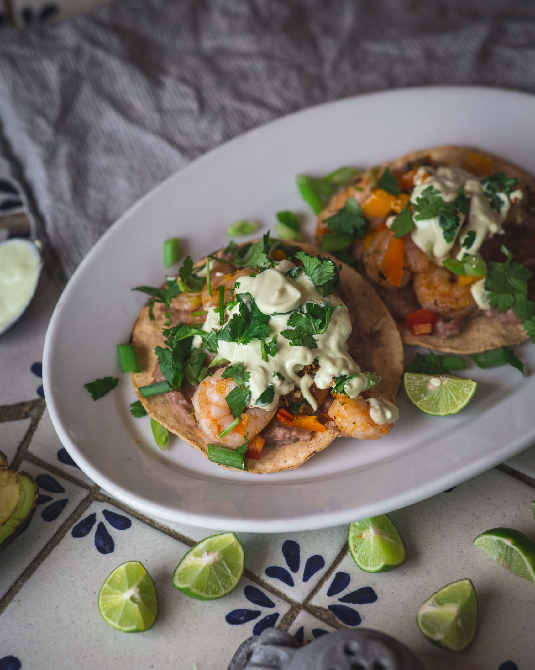 shrimp-tacos-with-avocado-crema-recipe-eatingwell