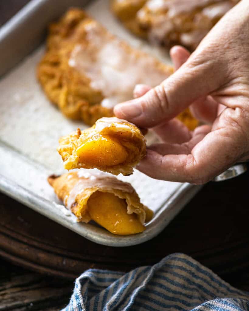 hand showing insde of fried pie
