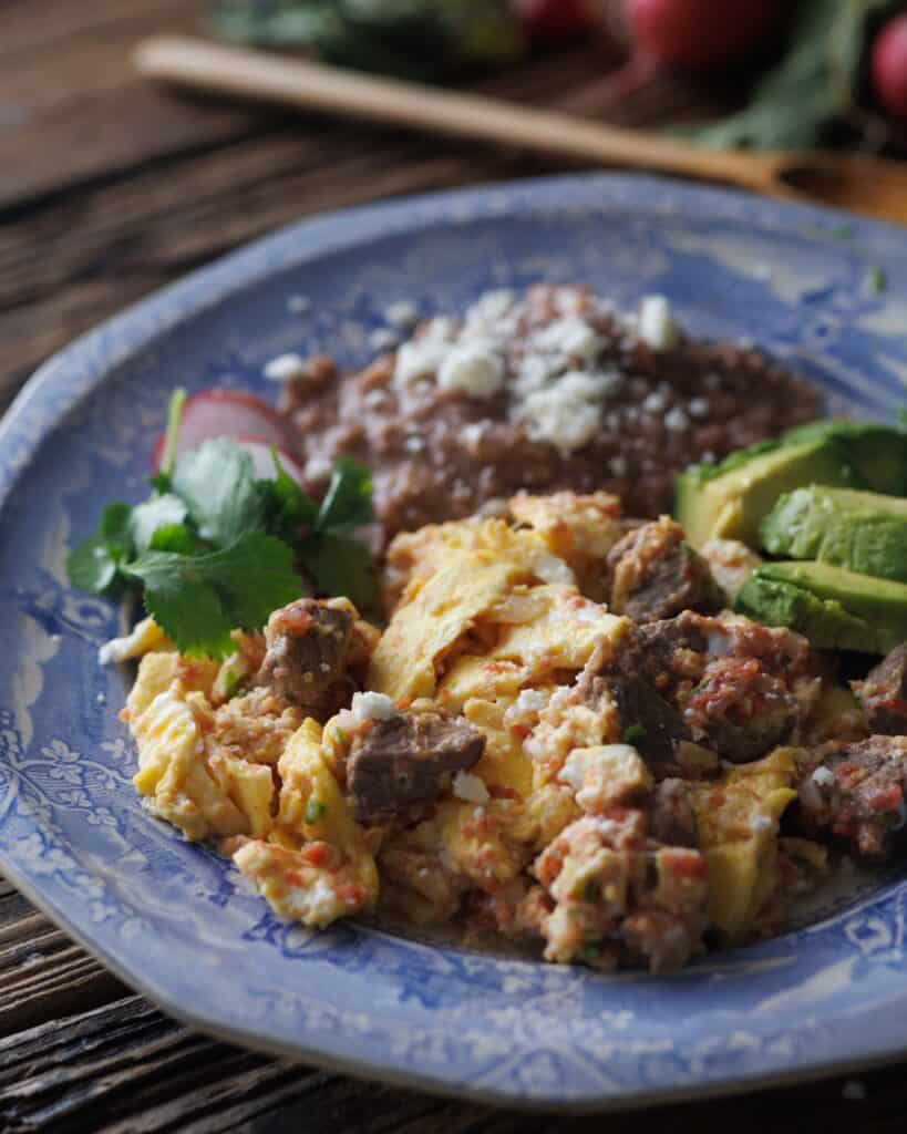 plate of eggs with steak